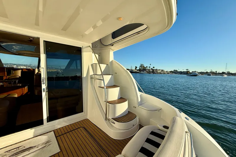 Slide: The Image of 2006 Meridian 391 Sedan yacht with elegant interior and scenic waterfront view. - 37