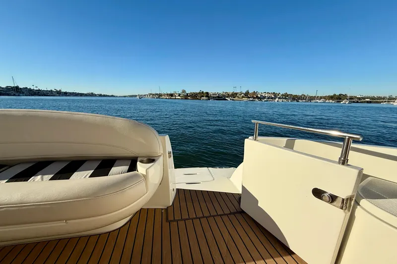 Slide: The Image of 2006 Meridian 391 Sedan yacht deck with scenic waterfront view. - 39