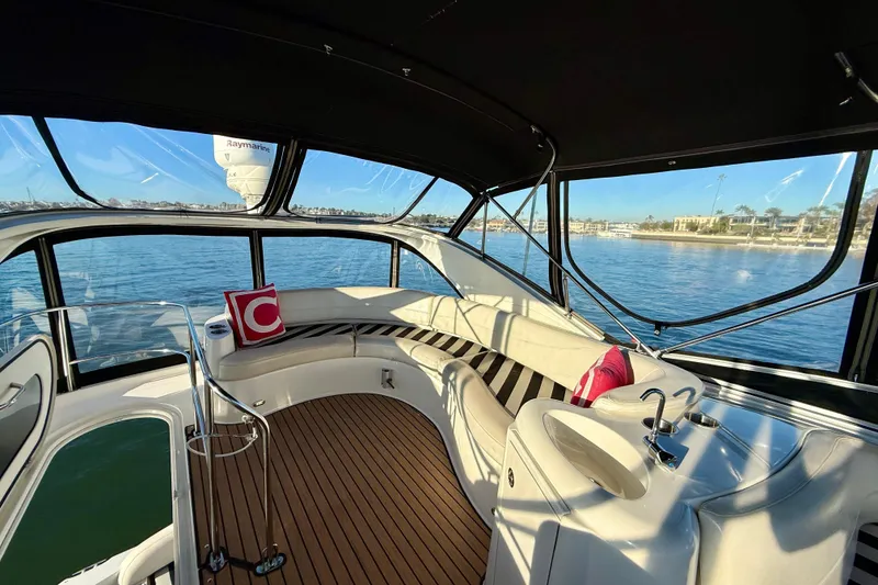 Slide: The Image of Luxurious interior of 2006 Meridian 391 Sedan yacht with scenic water view. - 41