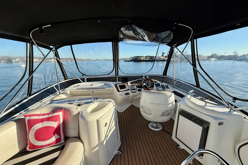 Slide: The Image of Interior view of 2006 Meridian 391 Sedan yacht with helm and seating area. - 42