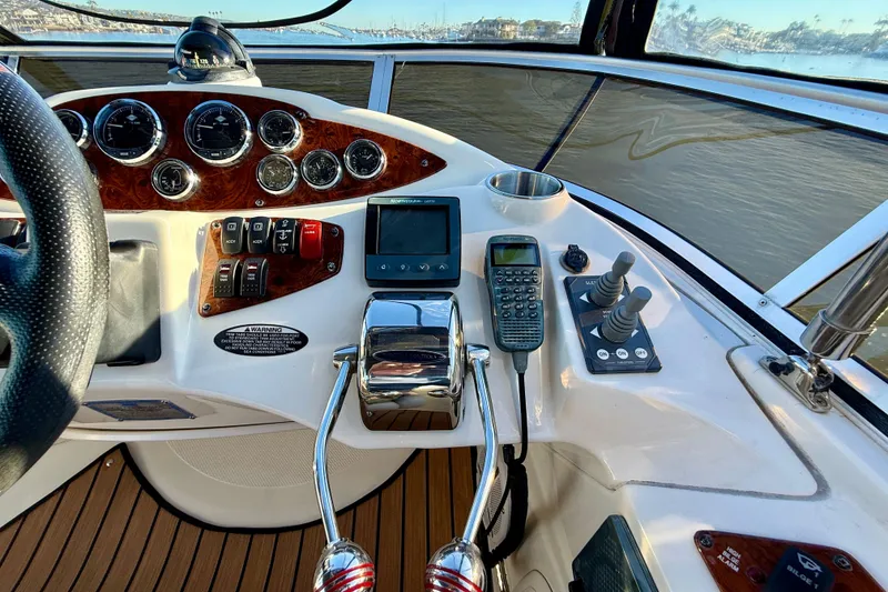 Slide: The Image of Control panel of a 2006 Meridian 391 Sedan yacht with navigation instruments. - 48