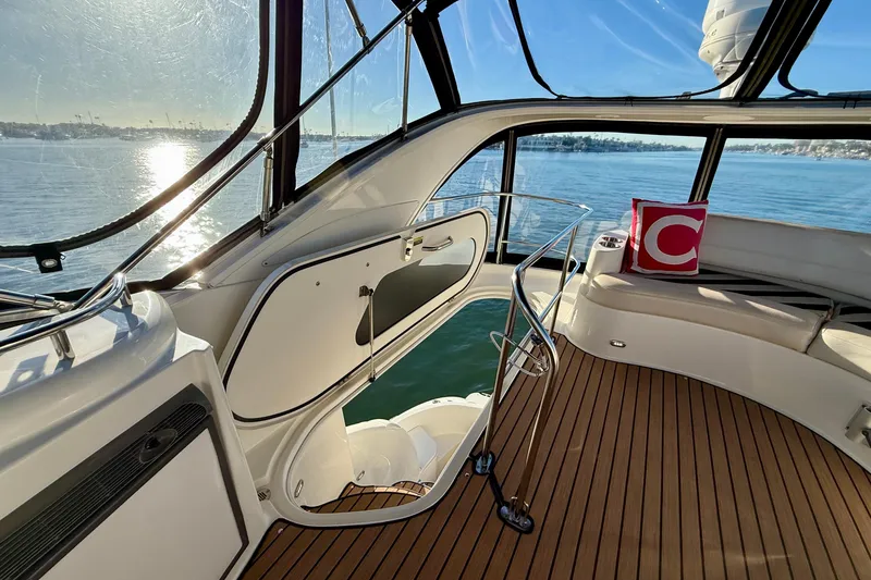 Slide: The Image of 2006 Meridian 391 Sedan yacht interior with ocean view and stylish seating. - 51