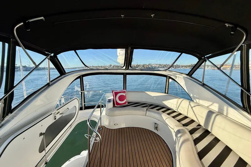 Slide: The Image of Interior view of 2006 Meridian 391 Sedan yacht with scenic water backdrop. - 53