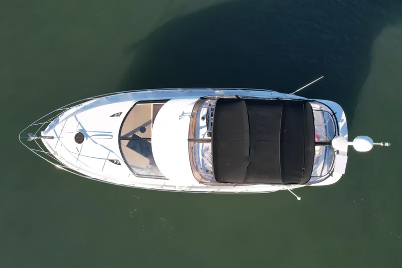 Slide: The Image of Aerial view of 2006 Meridian 391 Sedan yacht on calm water. - 6
