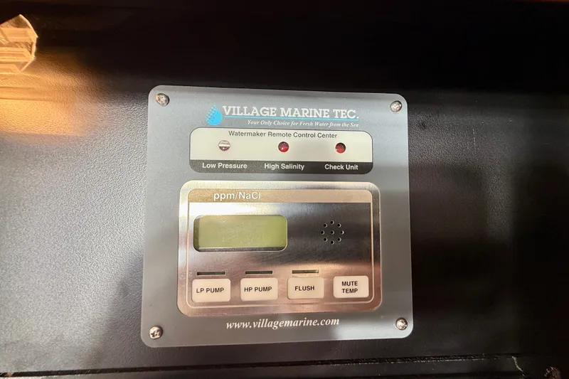 Slide: The Image of Village Marine Tec watermaker control panel on 2006 Meridian 391 Sedan yacht. - 66