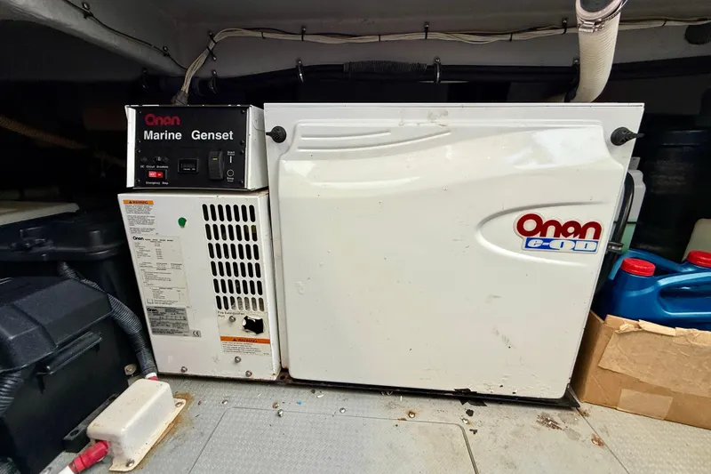 Slide: The Image of Onan marine generator in 2006 Meridian 391 Sedan engine room. - 67