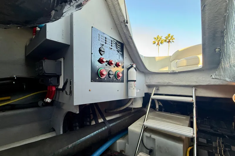 Slide: The Image of Engine room of 2006 Meridian 391 Sedan with control panel and ladder. - 76