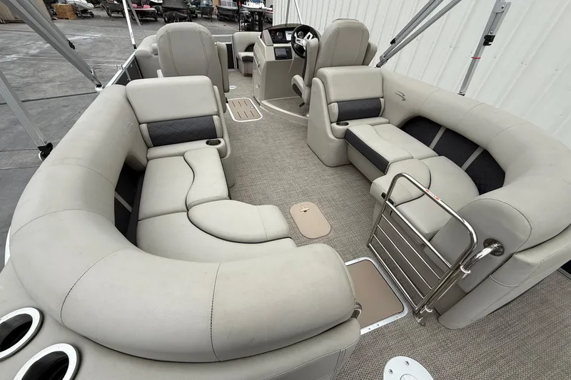 Slide: The Image of 2020 Bennington 22 SSRFBXP pontoon boat interior with plush seating and modern design. - 14