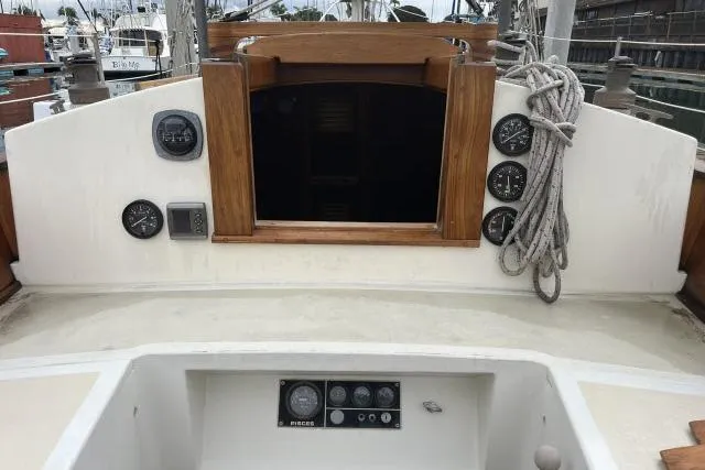 Slide: The Image of Cockpit of 1977 Alajuela A38 sailboat with gauges and rope. - 21