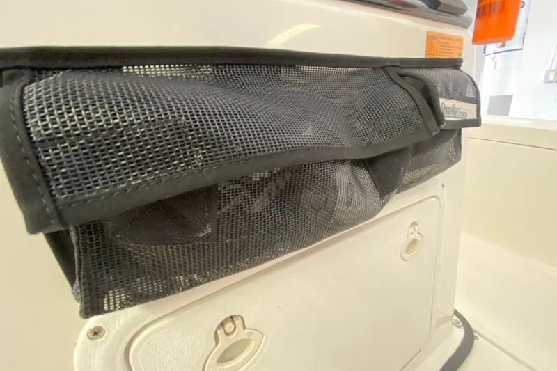 Slide: The Image of Mesh storage pocket on a 2008 Famous Craft 18 boat console. - 45