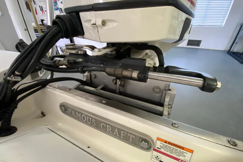 Slide: The Image of Famous Craft 18 boat engine detail, 2008 model, showcasing mechanical components and branding. - 67