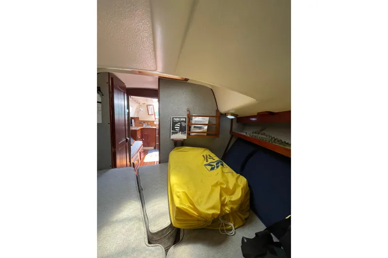Slide: The Image of Interior of a 1978 Hunter 30 sailboat, featuring cozy cabin space. - 25
