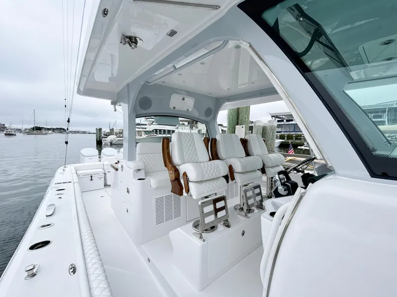 Slide: The Image of 2025 HCB 48 Campeon luxury boat interior with plush seating and modern design. - 27