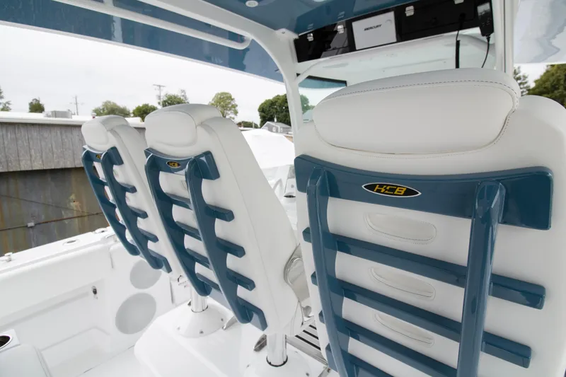 Slide: The Image of 2025 HCB 42 Lujo boat interior with luxurious seating and modern design. - 13