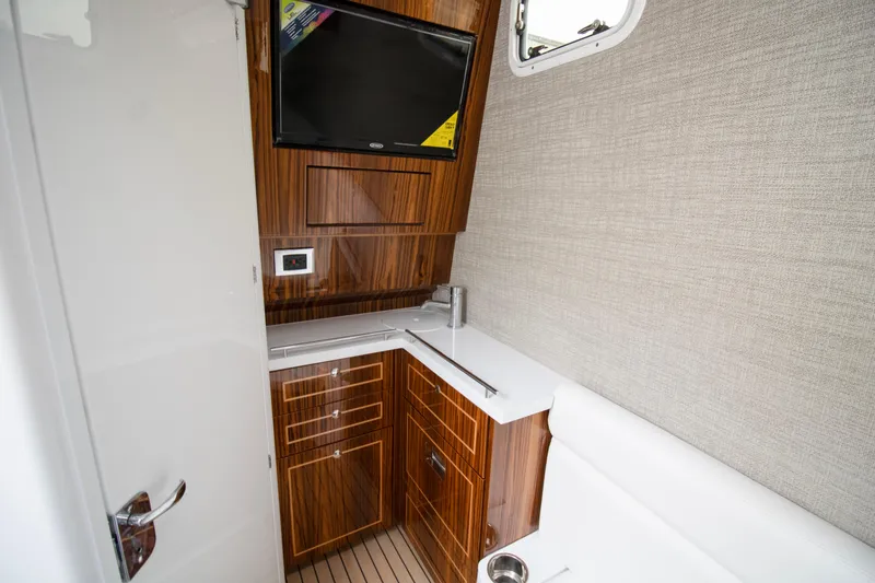 Slide: The Image of Interior of 2025 HCB 42 Lujo yacht with open wooden drawer and modern design. - 33