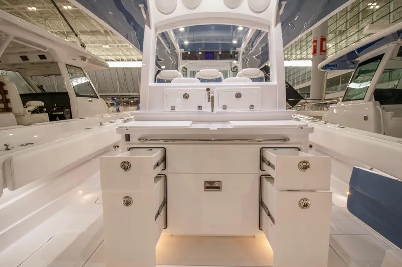 Slide: The Image of Helm of 2025 HCB 42 Lujo boat with modern navigation displays. - 42