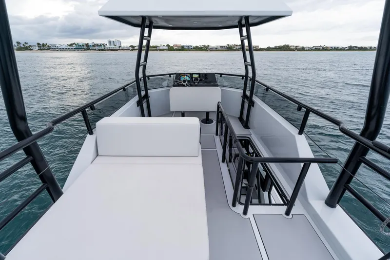 Slide: The Image of 2023 Vandal 46 Explorer boat interior with sleek design and ocean view. - 26