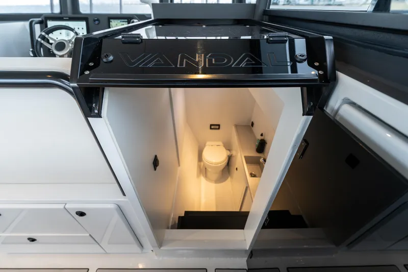 Slide: The Image of 2023 Vandal 46 Explorer yacht interior with compact bathroom and modern design. - 38