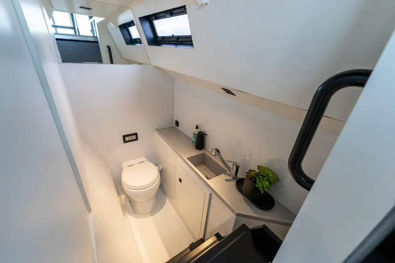 Slide: The Image of Modern bathroom interior on 2023 Vandal 46 Explorer yacht, featuring sleek design and compact amenities. - 39