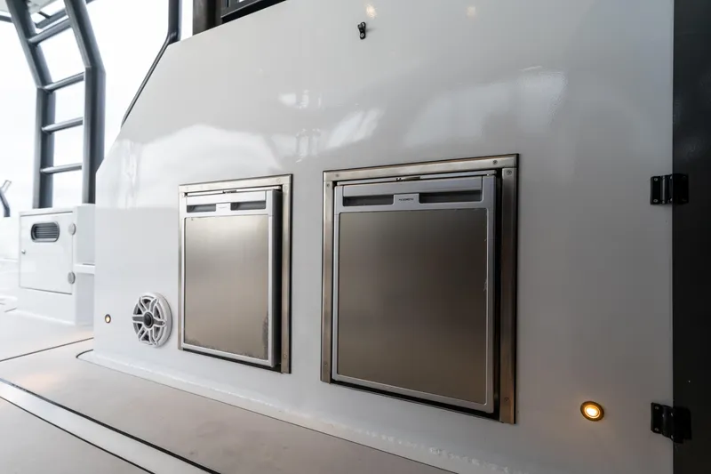 Slide: The Image of 2023 Vandal 46 Explorer yacht interior with stainless steel storage compartments. - 40