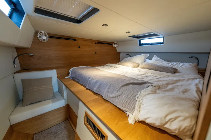 Slide: The Image of Luxurious cabin interior of 2023 Vandal 46 Explorer yacht with cozy bedding. - 49