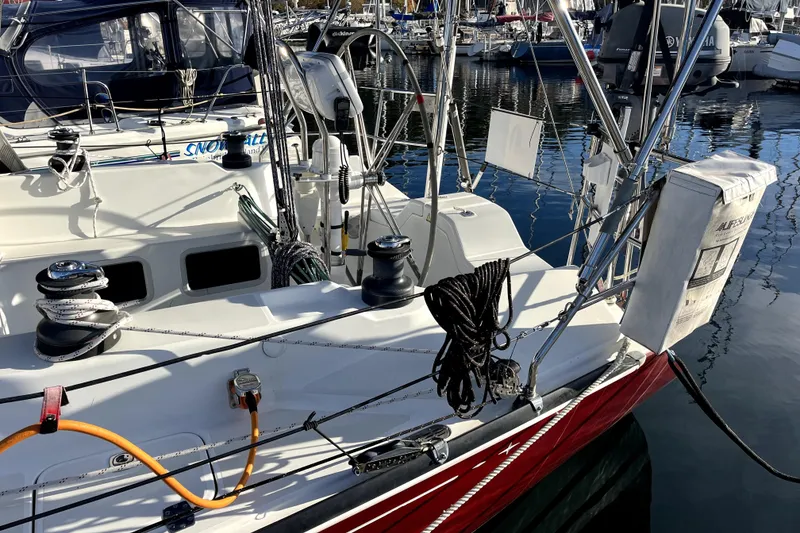 Slide: The Image of Sailboat deck with ropes and equipment, C&C 110 model, 2005, docked at marina. - 40
