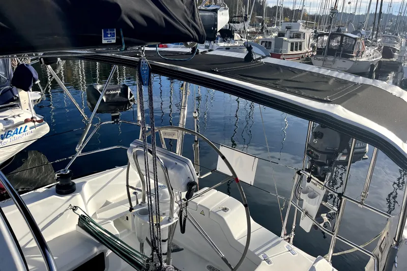 Slide: The Image of Cockpit of a 2005 C&C 110 sailboat docked in a marina. - 41