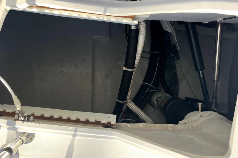 Slide: The Image of Engine compartment of a 2005 C&C 110 sailboat, showing mechanical components and wiring. - 50