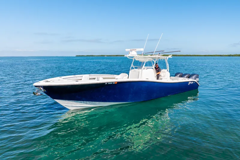 Slide: The Image of 2016 Yellowfin 36 Offshore boat on clear blue water, sunny day. - 14