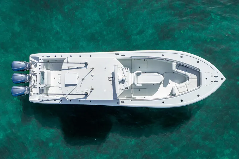 Slide: The Image of Aerial view of 2016 Yellowfin 36 Offshore boat on clear turquoise water. - 17