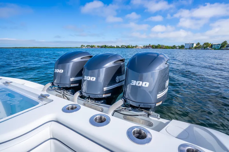 Slide: The Image of 2016 Yellowfin 36 Offshore boat with triple Yamaha 300 engines on open water. - 31