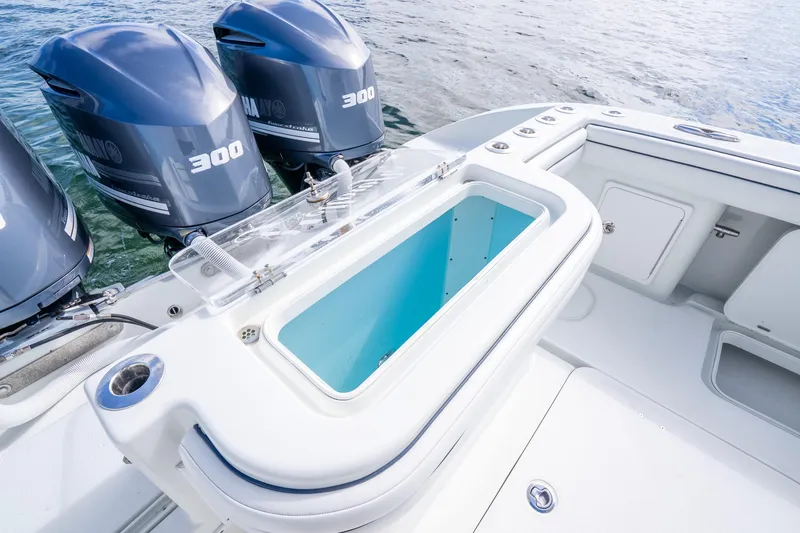 Slide: The Image of 2016 Yellowfin 36 Offshore boat with triple Yamaha 300 engines and open livewell. - 34