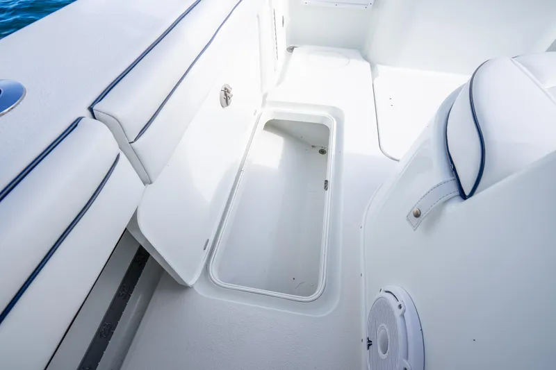 Slide: The Image of 2016 Yellowfin 36 Offshore boat interior storage compartment with open hatch. - 35