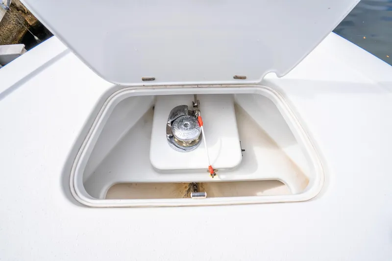 Slide: The Image of 2016 Yellowfin 36 Offshore boat anchor compartment with open hatch. - 43