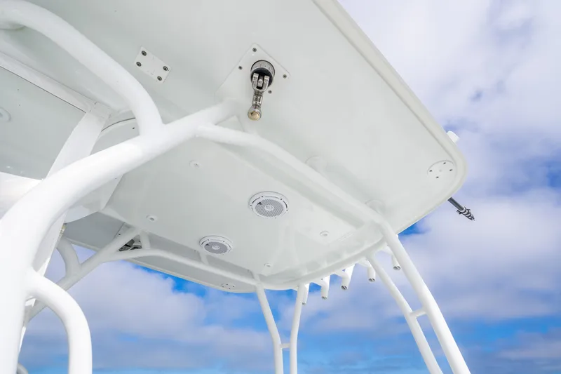 Slide: The Image of 2016 Yellowfin 36 Offshore boat's T-top against a blue sky. - 46
