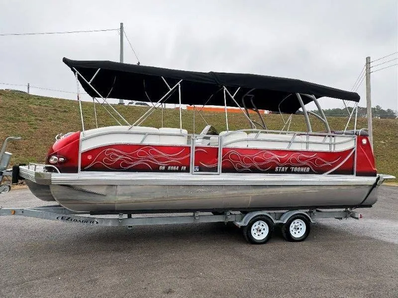 Slide: The Image of Red 2008 JC 246 IO pontoon boat on trailer. - 12