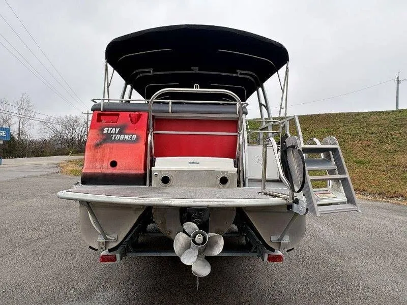 Slide: The Image of Rear view of a 2008 JC 246 IO boat with propeller. - 13