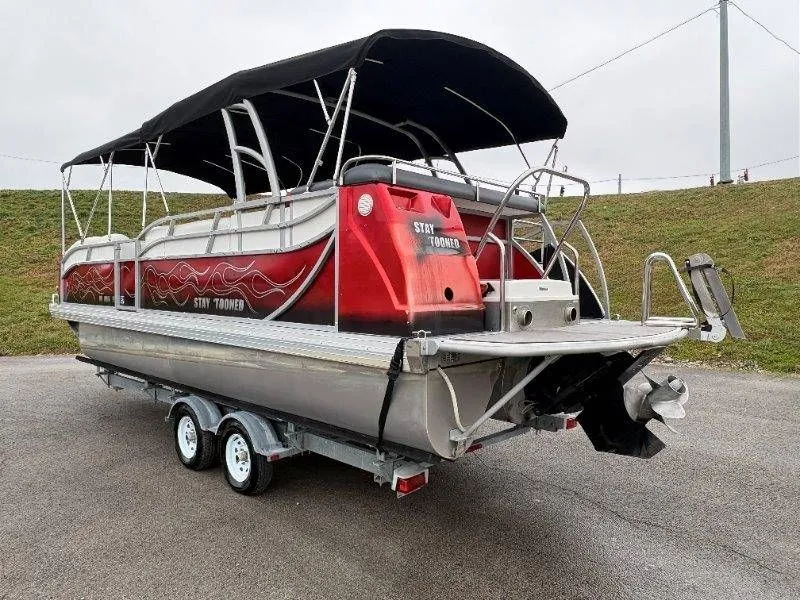Slide: The Image of Red 2008 JC 246 IO pontoon boat on trailer. - 16