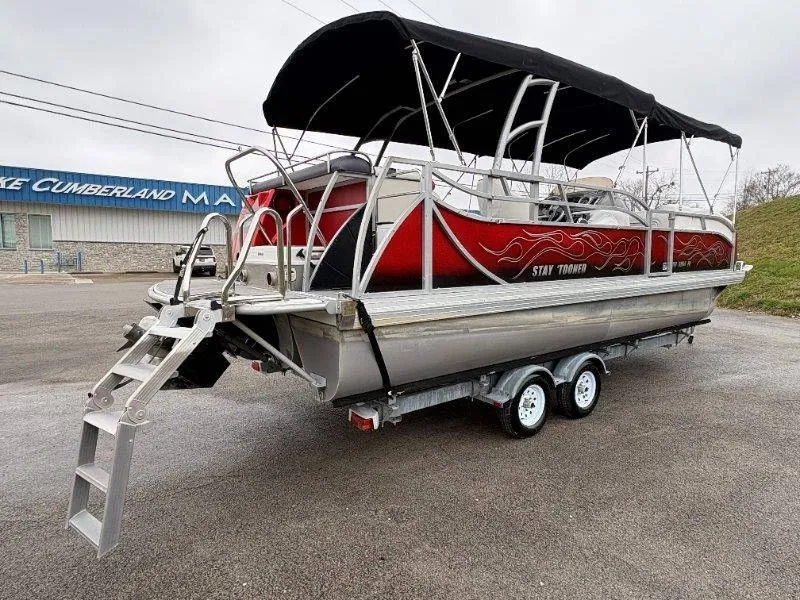 Slide: The Image of 2008 JC 246 IO pontoon boat with trailer, red design, covered. - 20