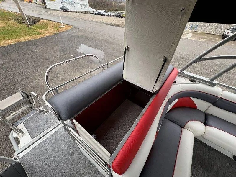 Slide: The Image of Interior of a 2008 JC 246 IO boat with storage compartment. - 21