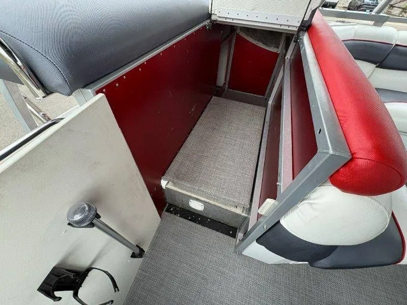 Slide: The Image of Interior of JC 246 IO boat, bench seat with storage. - 22