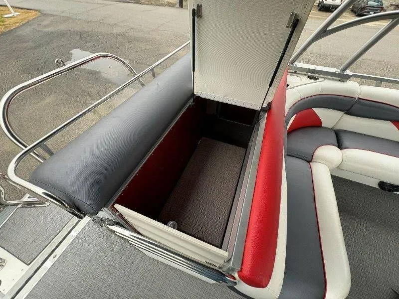 Slide: The Image of Open storage compartment on a 2008 JC 246 IO boat. - 24