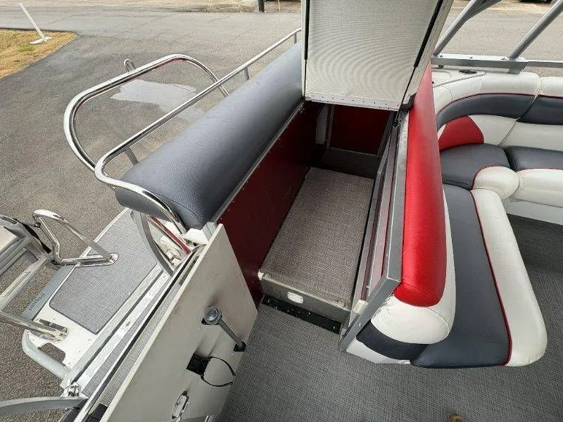Slide: The Image of Interior of JC 246 IO boat with seating and storage. - 29