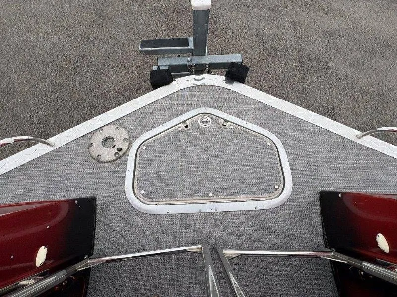 Slide: The Image of Bow deck of a 2008 JC 246 IO boat with gray carpet. - 42