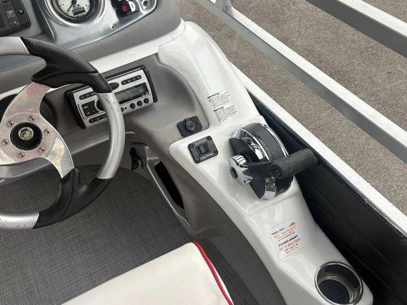 Slide: The Image of Steering console of a 2008 JC 246 IO boat. - 49