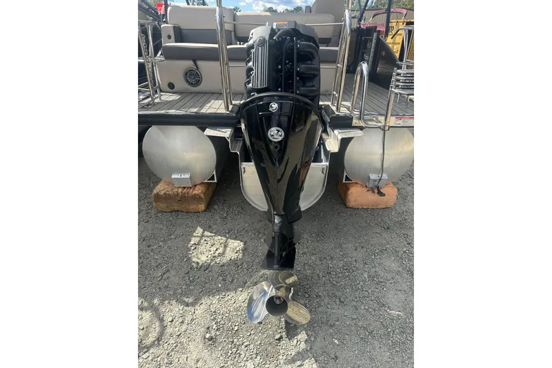 Slide: The Image of 2023 Harris HCX 230 Swingback pontoon boat with outboard motor, rear view. - 29