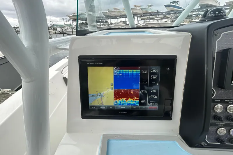 Slide: The Image of Garmin GPS display on 2016 Sea Fox 246 Commander boat dashboard at marina. - 11