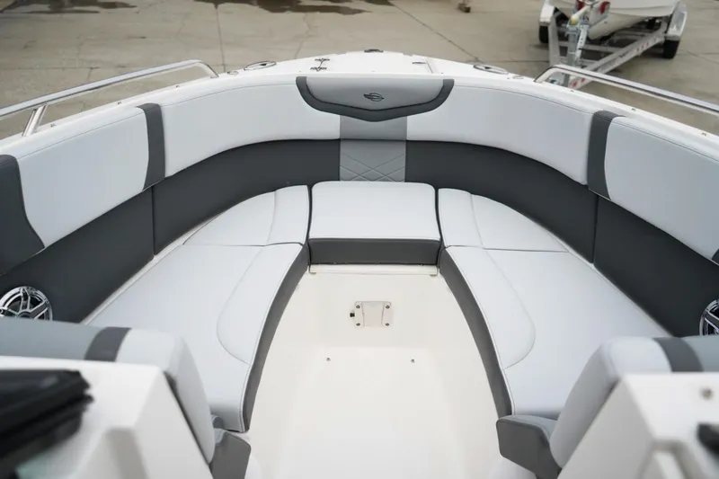 Slide: The Image of 2026 Chaparral 270 OSX boat interior with gray and white seating arrangement. - 22