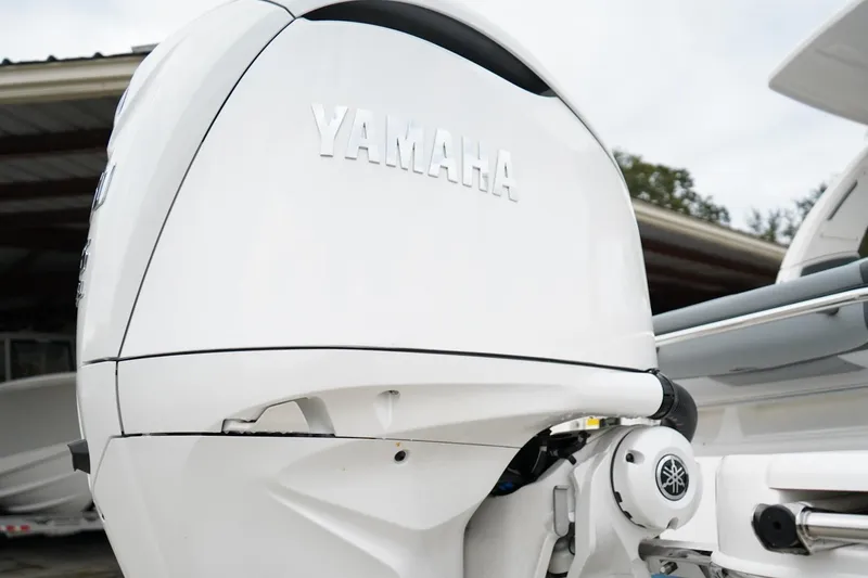 Slide: The Image of 2026 Chaparral 270 OSX with Yamaha outboard motor, showcasing sleek design and advanced engineering. - 29