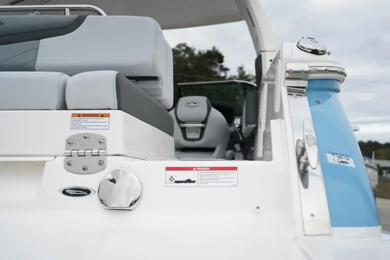 Slide: The Image of 2026 Chaparral 270 OSX boat interior, featuring sleek seating and modern design elements. - 7